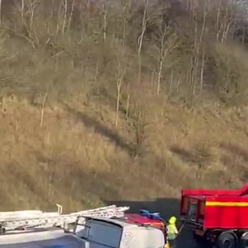 Lorry bursts into flames sparking motorway mayhem on the M40