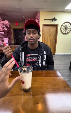 Closed Eyes Poking a Straw Into Boba Fail