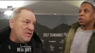 Harvey Weinstein preventing am reporter from asking Jay Z question about Donald Trump