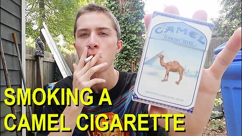 smoking a camel cigarette and vibing