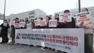 South Koreans protest against military drills after accidental bombing