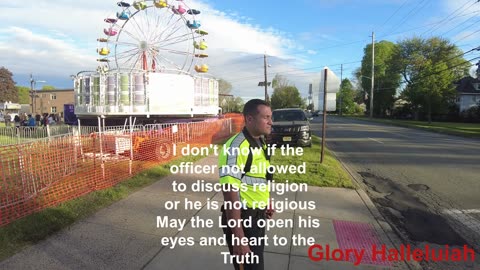 Witnessing to a police officer about Jesus Christ.