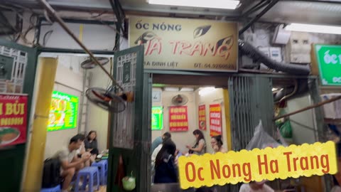 Eating snails in Hanoi, Vietnam