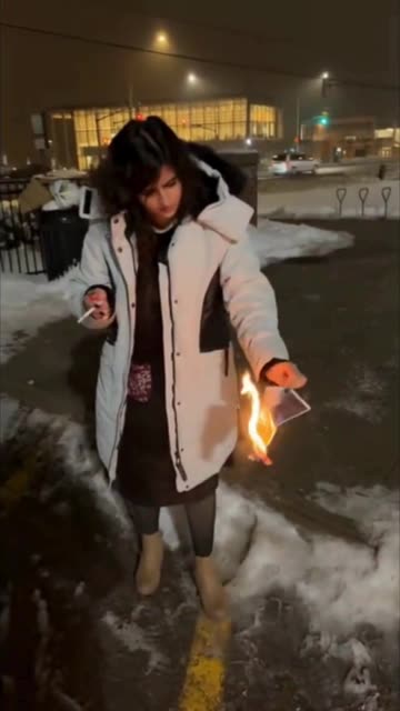 Now THIS is BRAVERY- Iranian Woman Signs her Own Death Warrant by Burning Photo of Supreme Leader