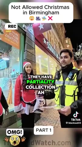 Birmingham, UK Two young Girls signing Christmas Carols to collect money f