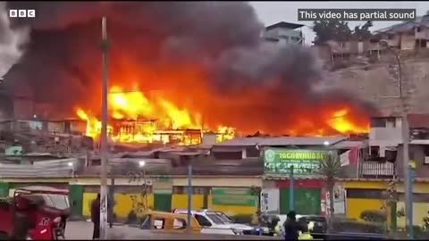 Drone captures huge fire engulfing homes in Peru