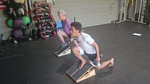 Slant Board Knees Over Toes Lunge to Curl