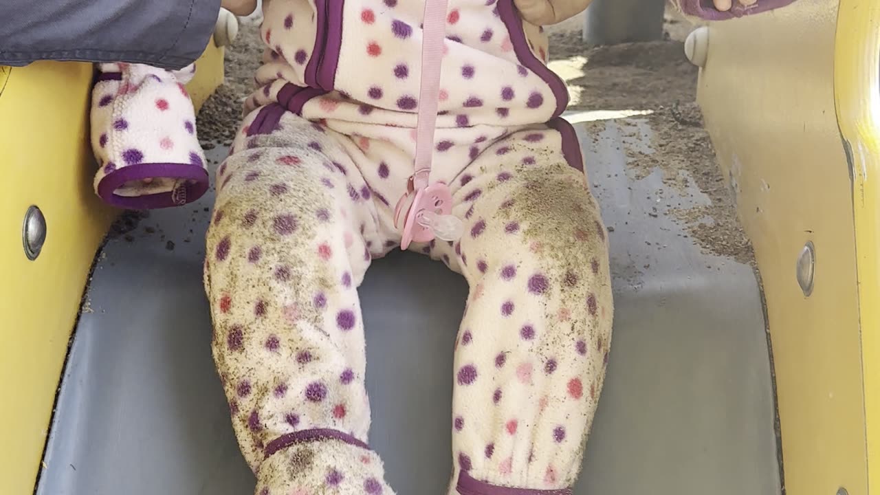that first slide feeling 😍 baby kayla trying out the playground slide with mommy’s help — so cute! 💖