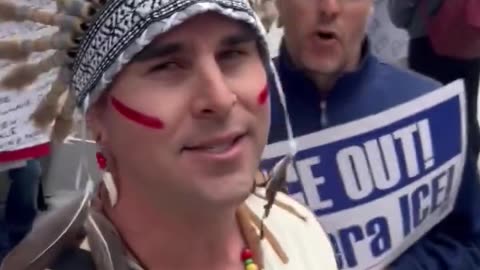 Trans-indigenous person at ICE protest