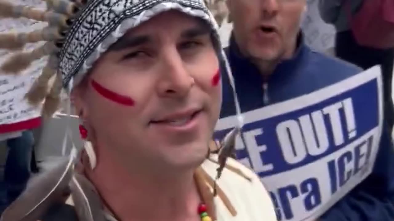 Trans-indigenous person at ICE protest