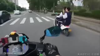 Scooter rider crashes due to not paying attention