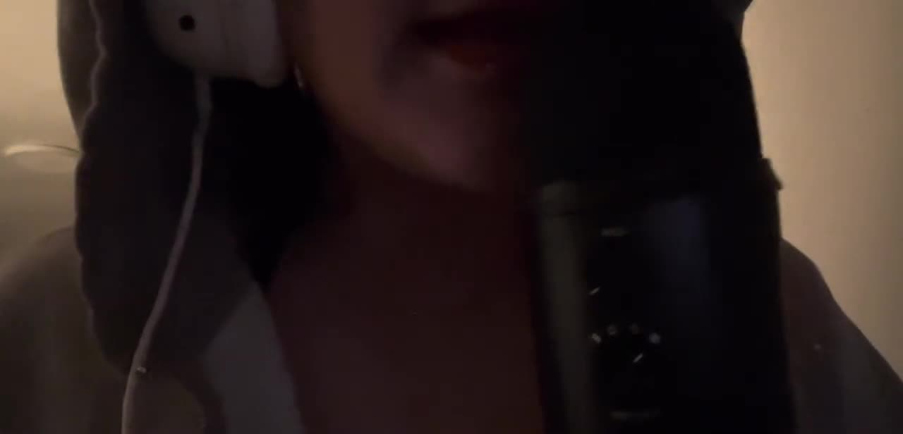 ASMR repeating the word "Tingly"