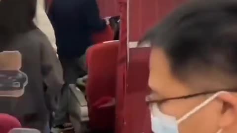 A video has emerged from a Chinese airline where man shouted that he was stuck in a “time loop”