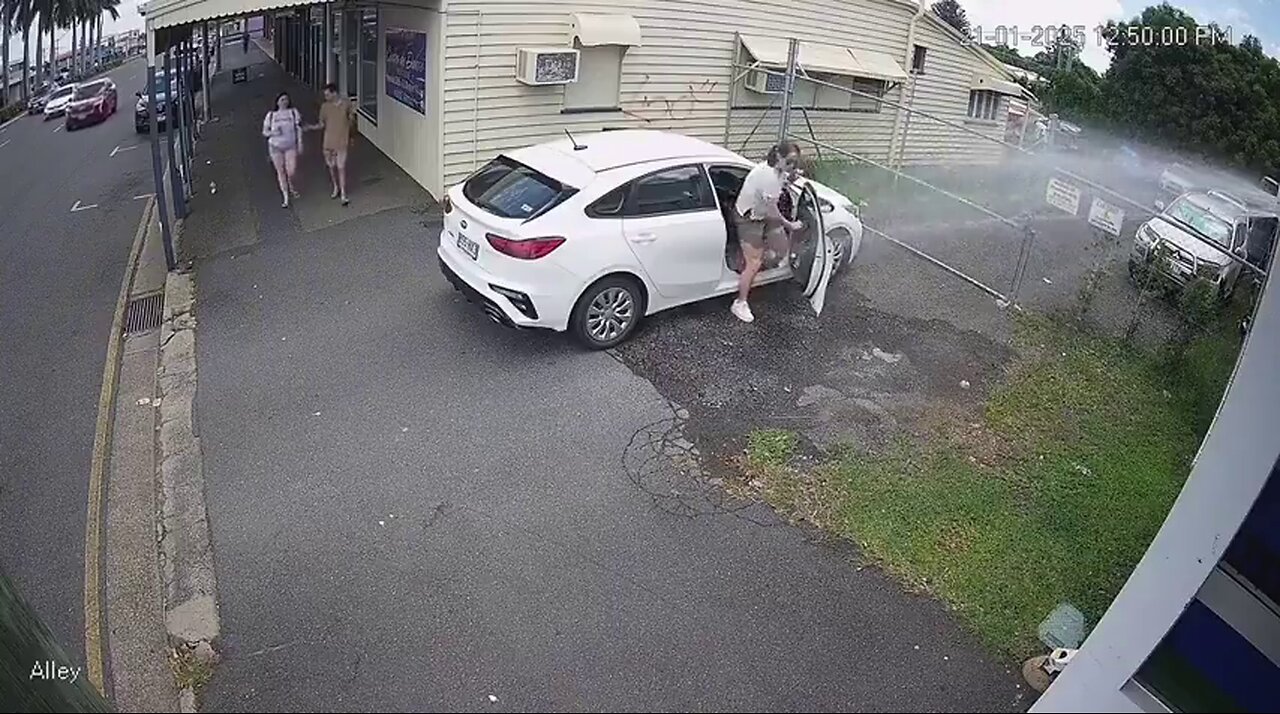 Aussie man's revenge on people parking in his driveway. Activates Sprinkler.