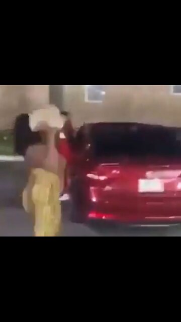 Women gang attack a woman after she throws large rock through car window