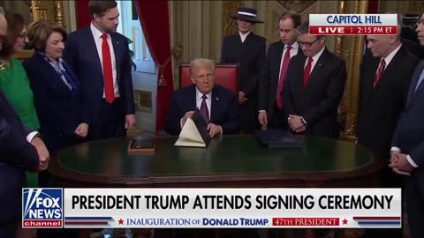 President Donald Trump signs the first executive orders of his term