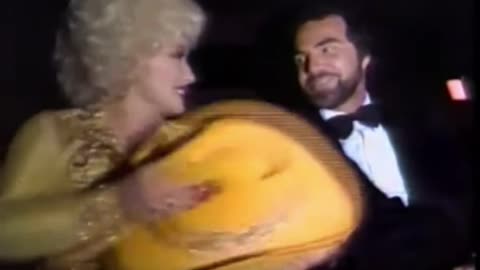 Dolly Parton & Burt Reynolds after the premiere of "The Best Little Whorehouse in Texas"