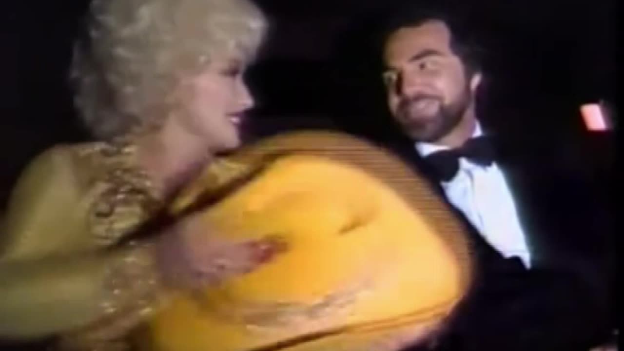 Dolly Parton & Burt Reynolds after the premiere of "The Best Little Whorehouse in Texas"