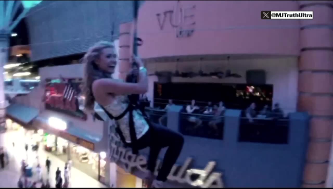 Erika Kirk in old music video zip-lines past 9:10 timestamo