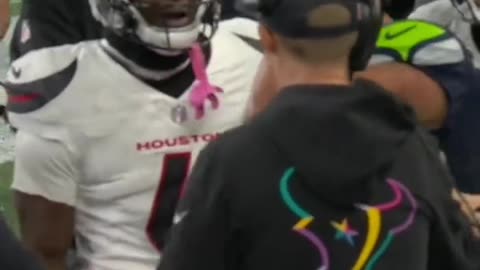 The ref protected JSN in the middle of the scuffle.