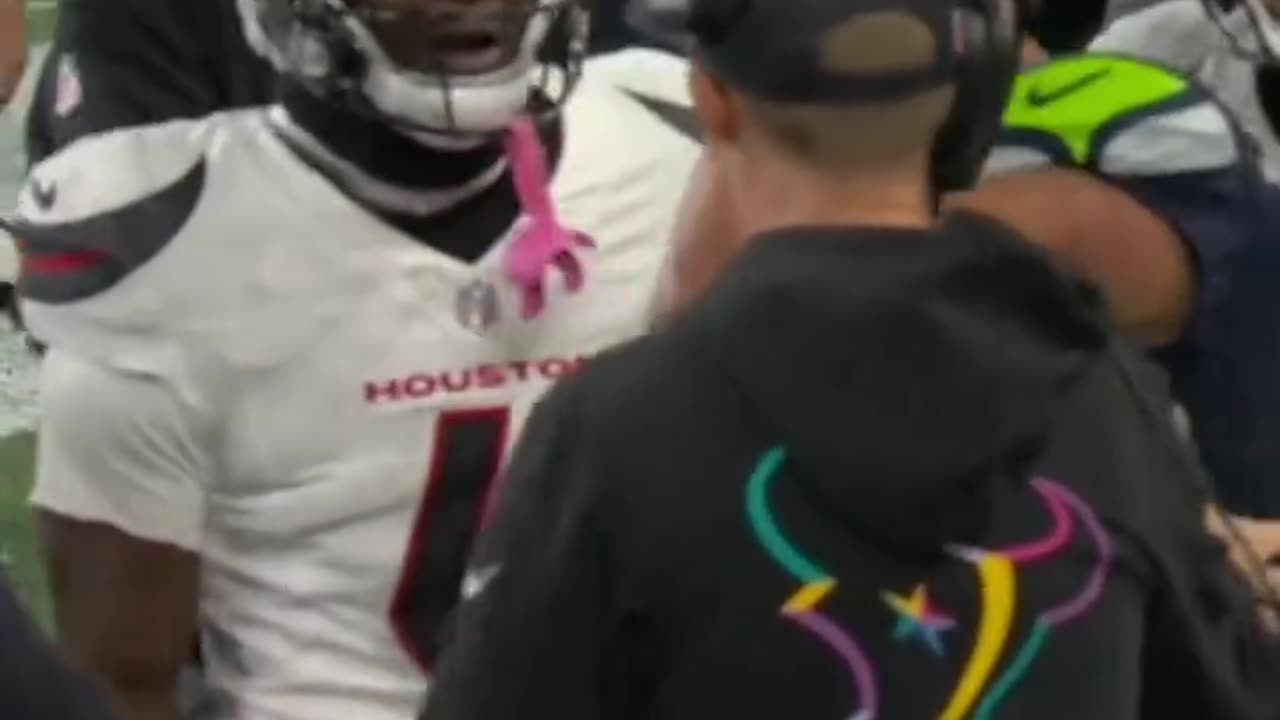 The ref protected JSN in the middle of the scuffle.