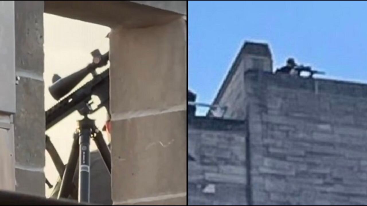 Sniper on the roof of the Indiana Memorial Union. Gun pointed down at peaceful Gaza