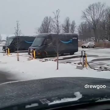 Amazon electric vehicles being charged in the snow - LOL The whole thing is a SCAM