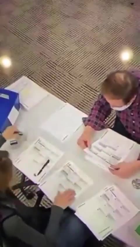 This is footage of poll workers in Delaware County, PA filling out ballots during the 2020 ...