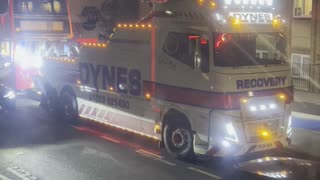 Recovery track attends to a damaged bus in east London