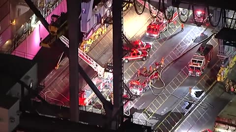 Aerials show fire being extinguished on ship at San Pedro port