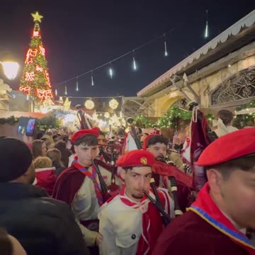 Armenian and Palestinian Christian scouts marching at the Christmas Tree lighting in Jerusalem