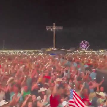 Thousands of Patriots unite to sing "God Bless the USA" at a Kid Rock concert.