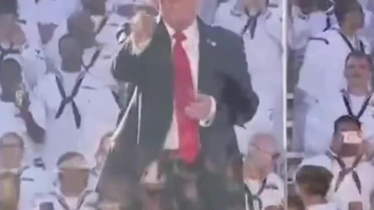 Trump Draws "Q" at end.