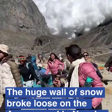 Dramatic moment avalanche roars down one of the world's highest mountains