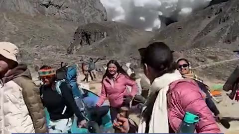 Dramatic moment avalanche roars down one of the world's highest mountains