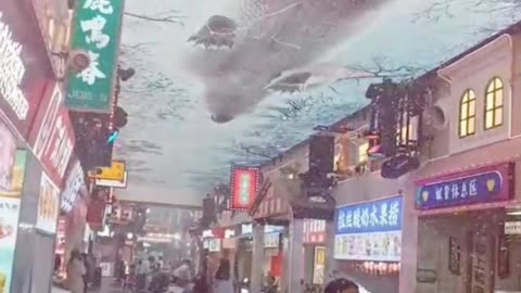 Ceiling Bear Optical Illusion and Artificial Snowfall Inside a Food Market