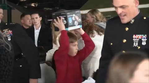 First Lady Melania Trump participates in a Toys for Tots charity drive event at Marine Corps