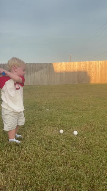 Toddler Practicing His Golf Game