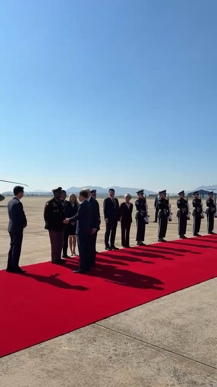 President Donald Trump lands in South Korea and is greeted with YMCA