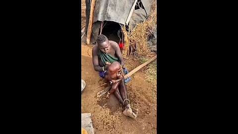Traditional way of bathing a baby