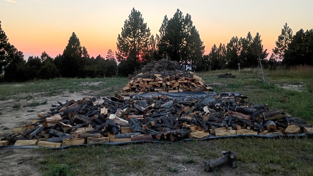 Stacking the remaining wood.