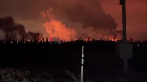 Debris strikes Ryazan oil refinery: Soldiers with AKs attempt to repel the attack.