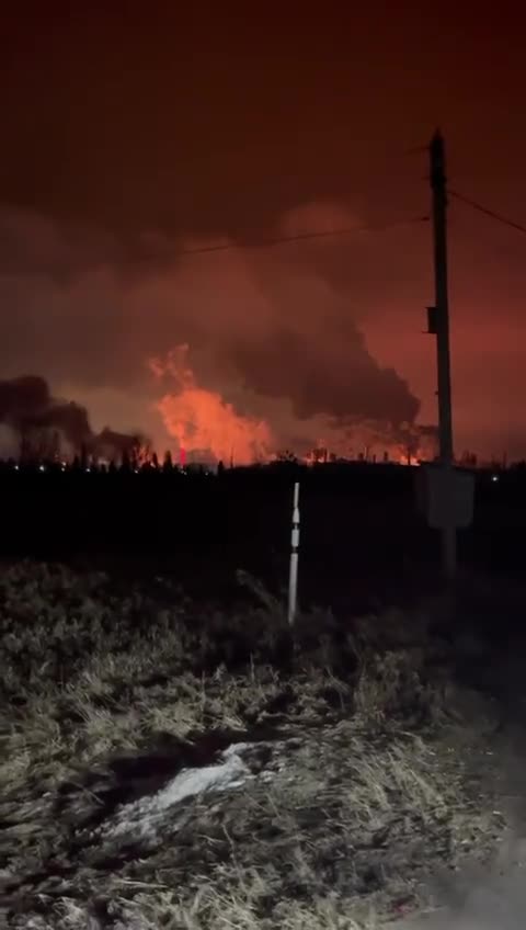Debris strikes Ryazan oil refinery: Soldiers with AKs attempt to repel the attack.