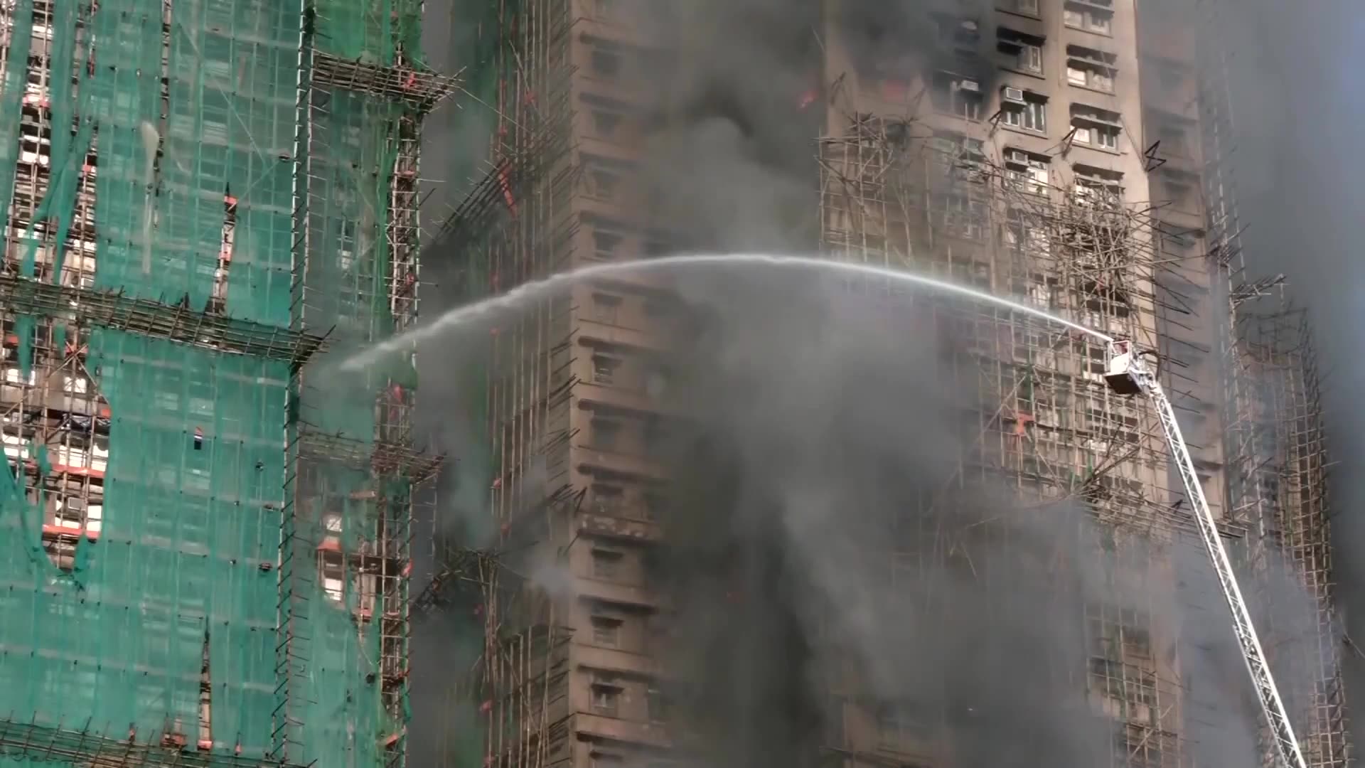 Several dead as fire engulfs residential high-rises in Hong Kong