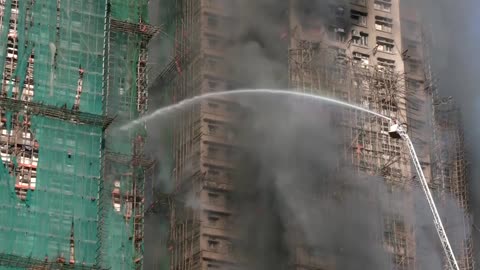 Several dead as fire engulfs residential high-rises in Hong Kong