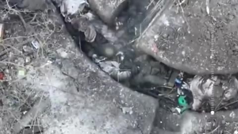Ukrainian drone hitting multiple Russian soldiers in trench with a drone drop F-1 grenades