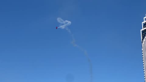 Aerobatic Planes Sketching Graceful Contrail Loops Over Surfers Paradise