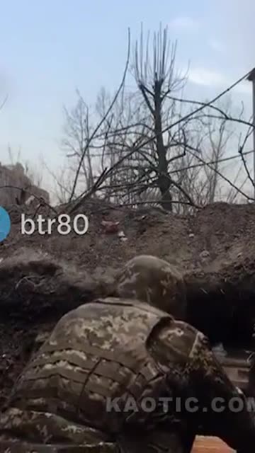 Ukraine troops in trench take direct hit