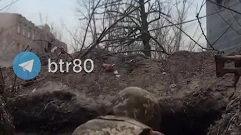 Ukraine troops in trench take direct hit