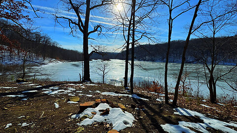 Winter Backpacking and Camping Near a Frozen Lake